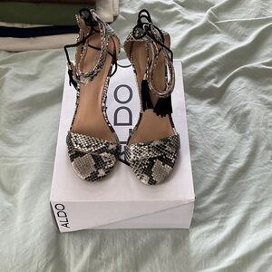 Aldo Black and Cream Snakeskin Heels